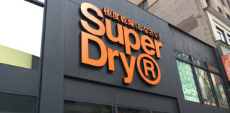 Superdry has announced a narrowing of losses in the year to 24 April as it announced that it is set to open a new flagship store on London’s Oxford Street.