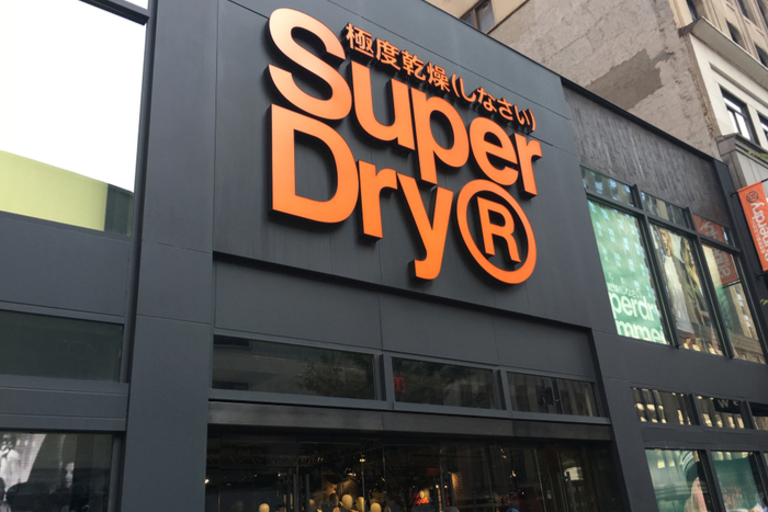 Superdry has announced a narrowing of losses in the year to 24 April as it announced that it is set to open a new flagship store on London’s Oxford Street.