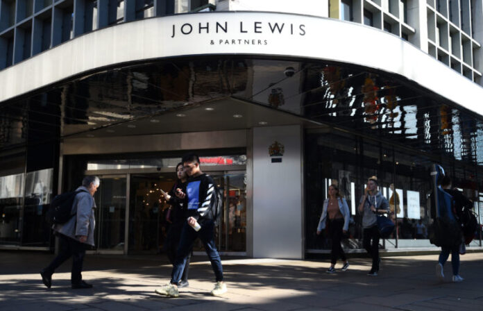 John Lewis Partnership swings to £635m half-year loss & axes bonus