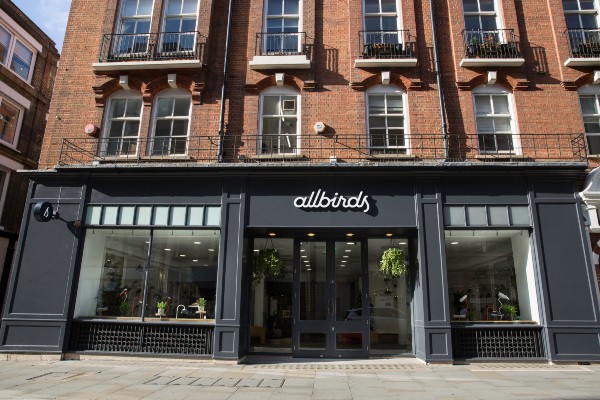 Allbirds topped market estimates for quarterly revenue as shoppers splurged on its eco-friendly shoes and athletic wear during the holiday season