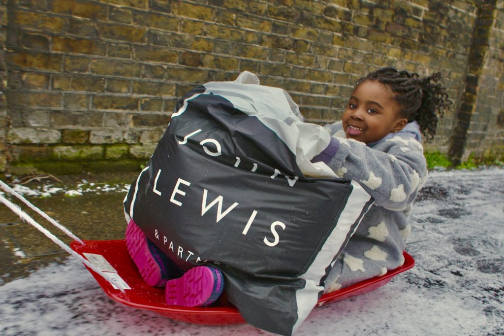 John Lewis donates warm clothing to thousands of families amid cold spell
