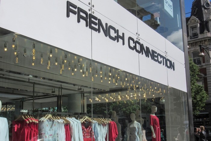 Losses were reduced and revenue at French Connection increased in the six months to 31 July, as the retailer reduced its overheads.