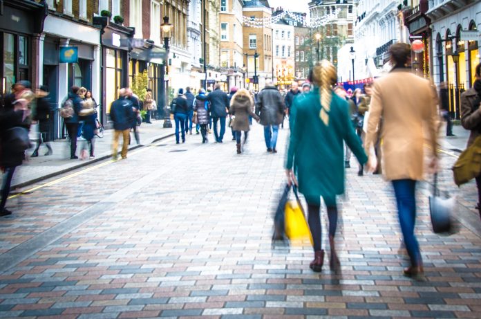 UK high street with people shopping