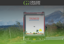 Tesco lorry driving on a road
