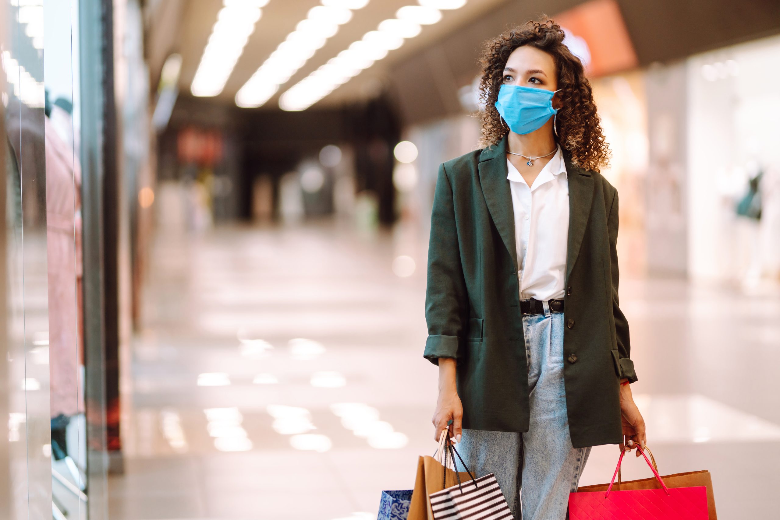 woman shopping with face mask