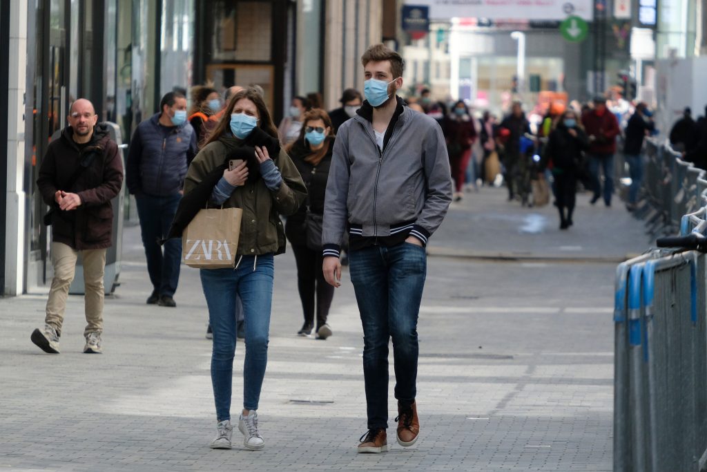 Shoppers wearing masks on high street
