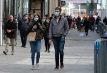 Shoppers wearing masks on high street