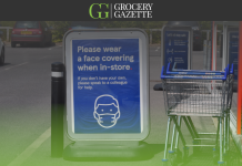 Will face masks really be a thing of the past? Sign outside Tesco asking customers to wear a fask mask