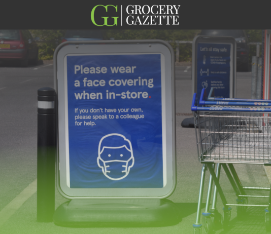 Sign outside Tesco asking customers to wear a fask mask
