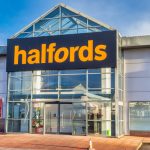 Halfords has revealed that strong sales in the months leading up to Christmas eased off in December due to the spread of Omicron.