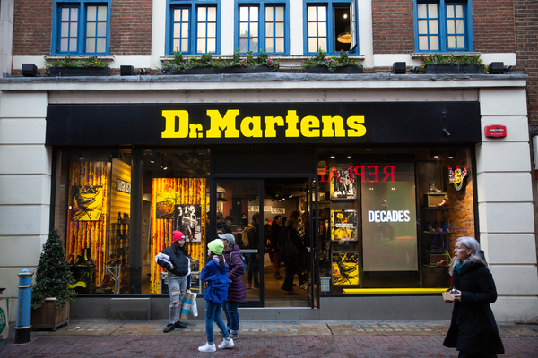 Shares in Dr Martens have plunged after a major investor offloaded a chunk of its stake at a discount price.