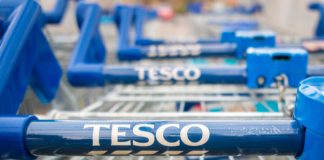 The UK's largest supermarket chain has reported a strong Christmas for sales in the face of "growing cost pressures and supply chain challenges".