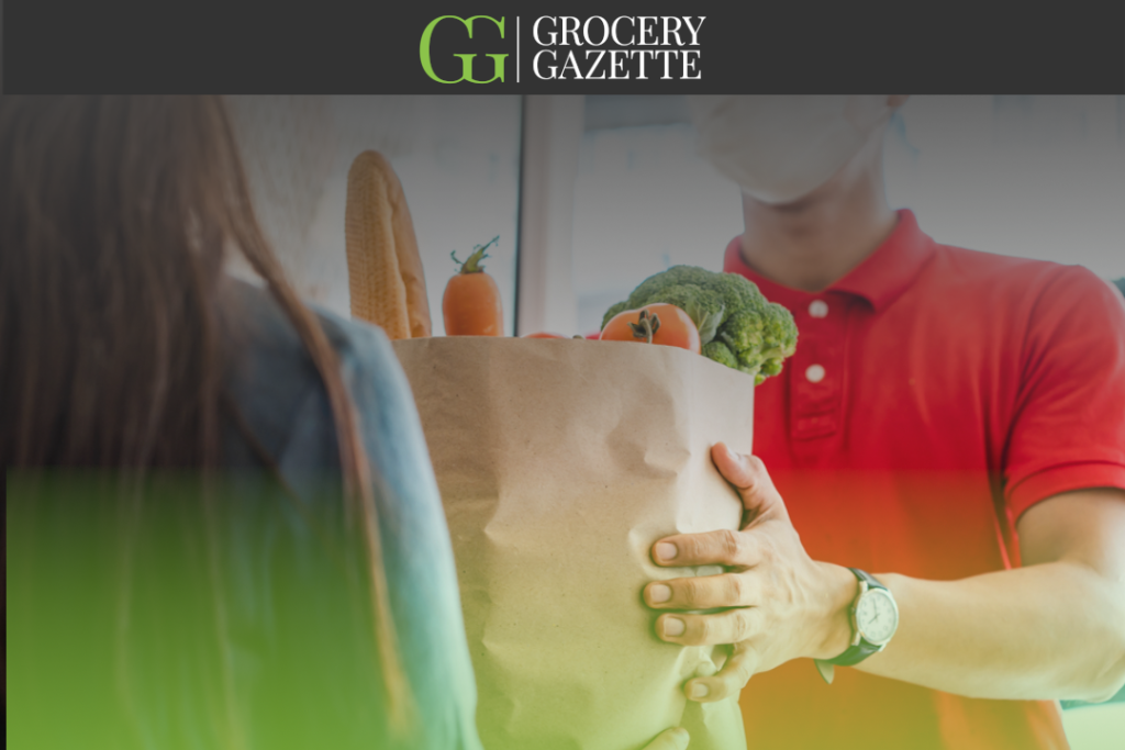 grocery delivery driver handing food to customer