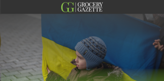 Ukraine flag held by a child