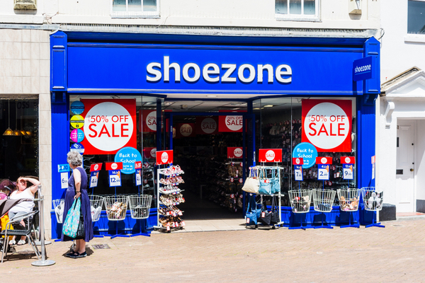 Budget shoe retailer Shoe Zone announced a strong comeback , for the 26 weeks to April 2.