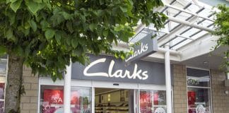 Clarks has reached an agreement with about 100 workers to end a two-month strike at its distribution centre in Somerset.