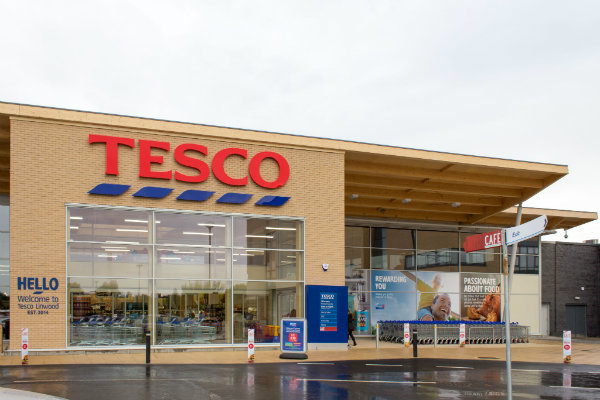 Shareholders file £100m lawsuit against Tesco over 2014 accounting ...
