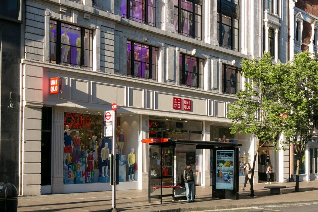 Uniqlo owner Fast Retailing has raised its forecast for the third consecutive year of record profits,