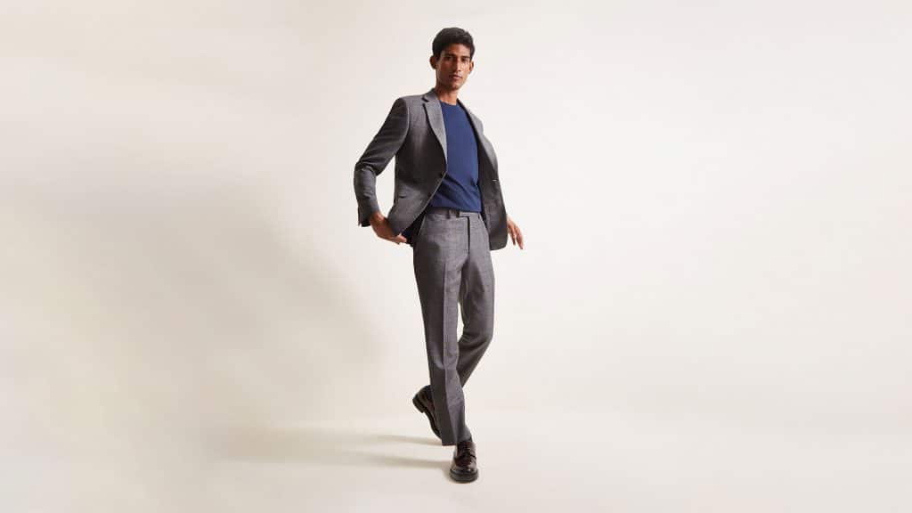 Moss Bros has launched its "Eco suit" made from recycled and natural materials. Each suit is made from up to 45 plastic bottles which would otherwise be sent to a landfill. Cut from recycled polyester-blend cloth with canvas and trims that have been consciously chosen for their low impact on the environment.