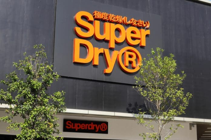 Superdry discounting promotional pricing trading update julian dunkerton CEO